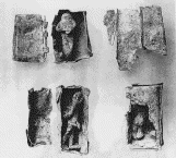 link to image of Kolossoi in their containers